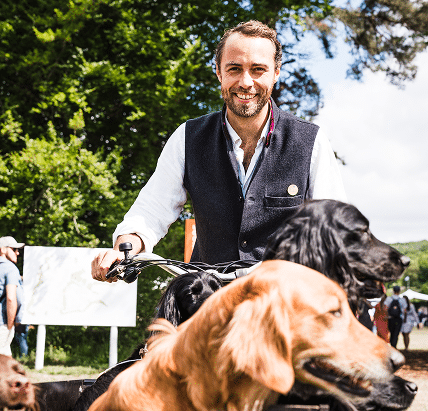 James middleton cycling with his dogs