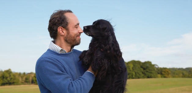 James Middleton holding his beloved dog Ella, who he recently had to cope with the loss of