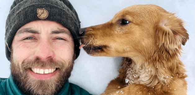 James Middleton and his Golden Retriever in snow