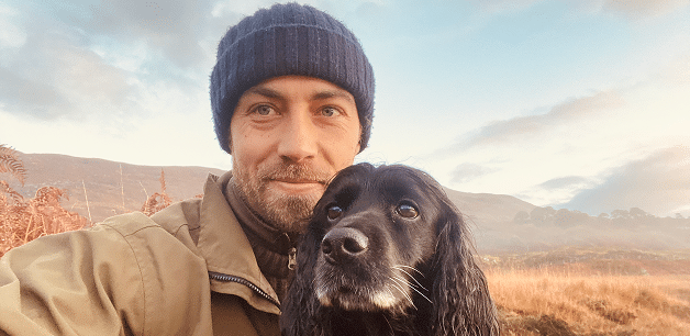 james middleton with his dogs ella in the scottish highlands