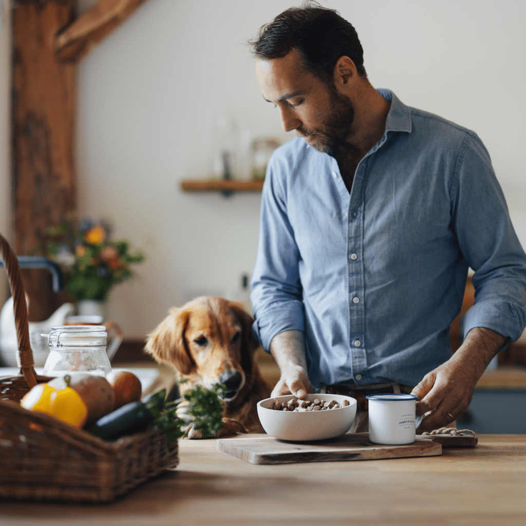 james middleton preparing his dog a meal